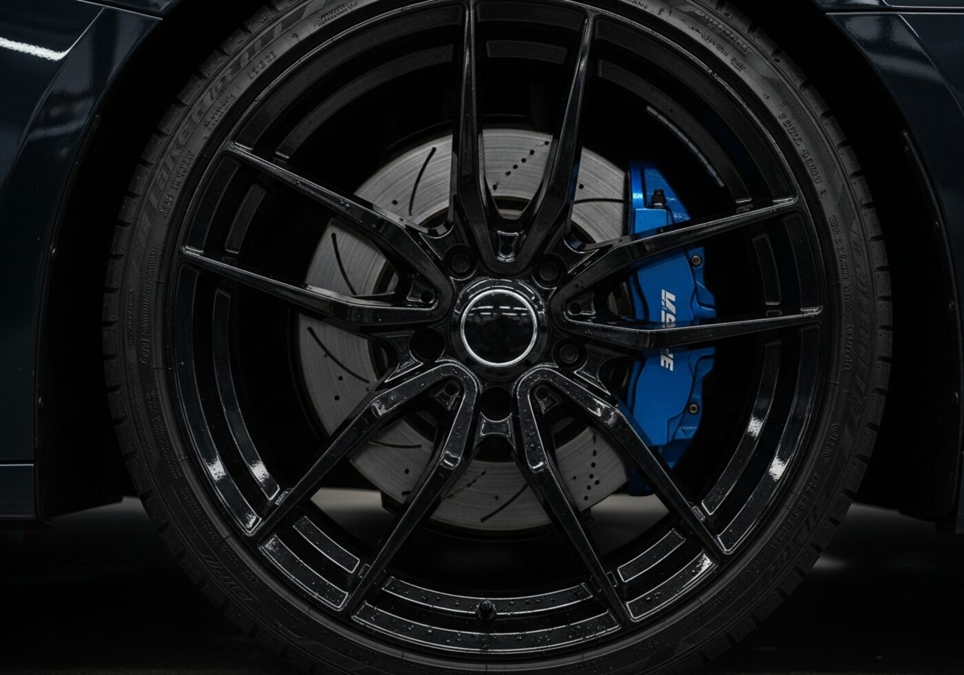 Detailed wheel with painted brake caliper